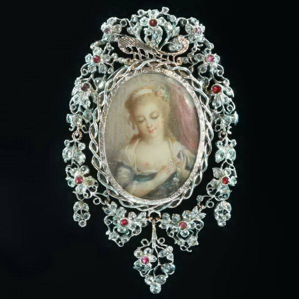 Romantic brooch pendant with painted miniature on ivory and paste stones from the antique jewelry collection of www.adin.be